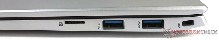 Direita: 2x USB-A, 1x microSD, 1x slot Kensington