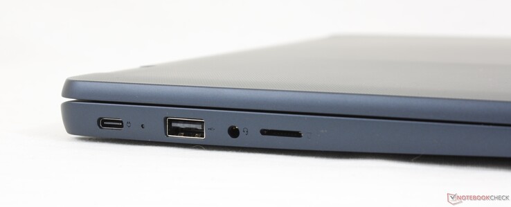 Esquerda: USB-C 2.0 (Power Delivery + DisplayPort 1.1), USB-A 2.0, fone de ouvido 3.5 mm, leitor MicroSD