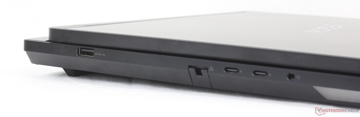 Esquerda: USB-A (10 Gbps), RJ-45, 2x USB-C Thunderbolt 4 com DisplayPort 2.1 + Power Delivery 3.0 140 W), fone de ouvido de 3,5 mm
