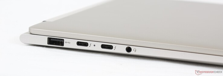 Esquerda: USB-A 3.2 Gem. 2, 2x Thunderbolt 4 c/ DP e PD, áudio combinado de 3,5 mm
