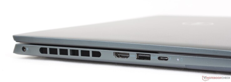 Esquerda: adaptador AC, HDMI 2.0, USB-A 3.2 Gen. 1, USB-C c/ Thunderbolt 4 + DisplayPort + Fornecimento de energia