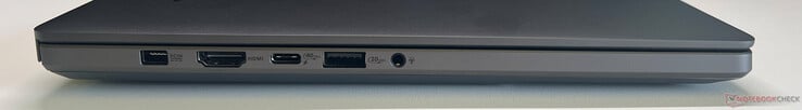 Esquerda: fonte de alimentação, HDMI 2.1 FRL, USB-C 4.0 (40 GBit/s, DisplayPort ALT Mode 2.1, Power Delivery 3.0), USB-A 3.2 Gen 2 (10 GBit/s), áudio de 3,5 mm