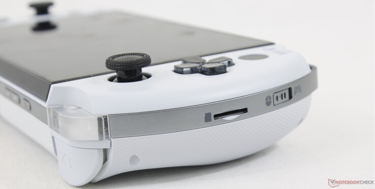 Esquerda: Leitor MicroSD, Gamepad/Mouse switch