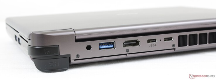 Atrás: USB-A 3.2 Gen. 2, HDMI 2.1, USB-C 4 c/ DisplayPort + Fornecimento de energia, USB-C c/ Thunderbolt 4 + DisplayPort + Fornecimento de energia