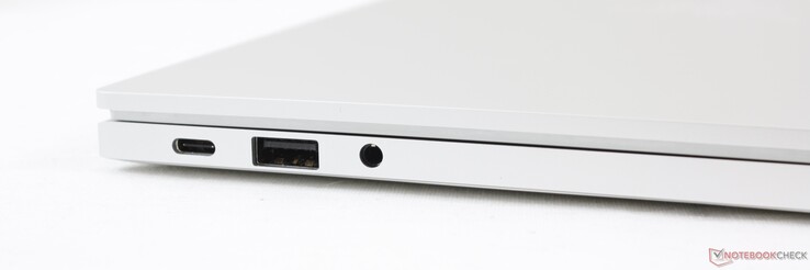 Esquerda: USB-C c/ Thunderbolt 4, Power Delivery, e DisplayPort, USB-A 3.1 Gen. 1, 3.5 mm de áudio combinado