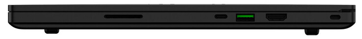 Lado direito: Leitor de cartões SD, uma porta Thunderbolt 3 (Type-C; DisplayPort e Power Delivery over USB-C), uma porta USB 3.2 Gen 2 Type-A, saída HDMI, Slot de segurança Kensington
