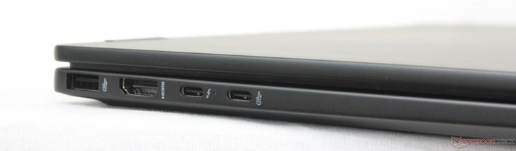 Esquerda: USB-A (10 Gbps), HDMI 2.1, USB-C Thunderbolt 4 com DisplayPort + fornecimento de energia, USB-C (10 Gbps) com DisplayPort + fornecimento de energia