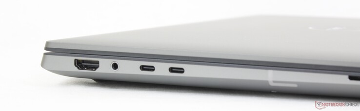 Esquerda: HDMI 2.0, fone de ouvido de 3,5 mm, 2x Thunderbolt 4 com DisplayPort + Power Delivery, leitor de SmartCard (opcional)