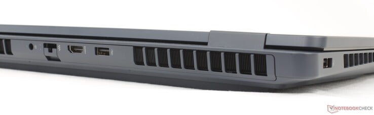 Parte traseira: adaptador CA, RJ-45 (1 Gbps), HDMI 2.1, USB-A (10 Gbitps)