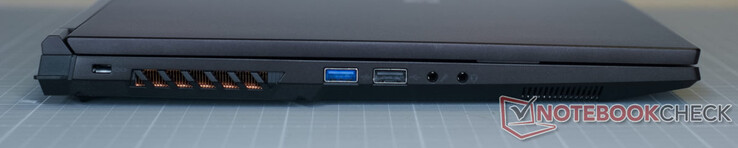 Slot de segurança Kensington; USB-A 3.2 Gen1; USB-A 2.0; entrada de microfone; tomada de fone de ouvido (compatível com vários fones de ouvido)