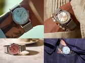 Relógios Timex x Todd Snyder Marlin Mesh com mostradores prateados, azul-água e salmão com efeito sunburst, exibidos no pulso e fora dele.