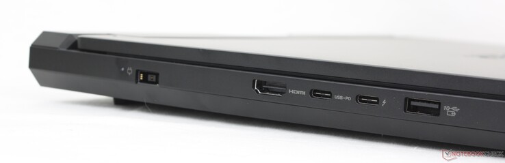 Esquerda: Adaptador CA, HDMI 2.1, USB-C 3.2 Gen. 2 (fornecimento de energia de 140 W + DisplayPort 2.1), USB-C Thunderbolt 4 (DisplayPort 2.1), USB-A 3.2 Gen. 2
