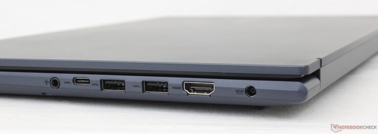 Direita: headset 3,5 mm, USB-C 3.2 Gen. 1, 2x USB-A 3.2 Gen. 1, HDMI 1.4, adaptador AC