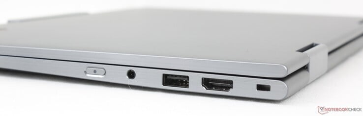 À direita: Botão liga/desliga, áudio de 3,5 mm, USB 3.2 Gen 1 (5 Gbit/s), HDMI 2.1, slot de segurança Kensington Nano